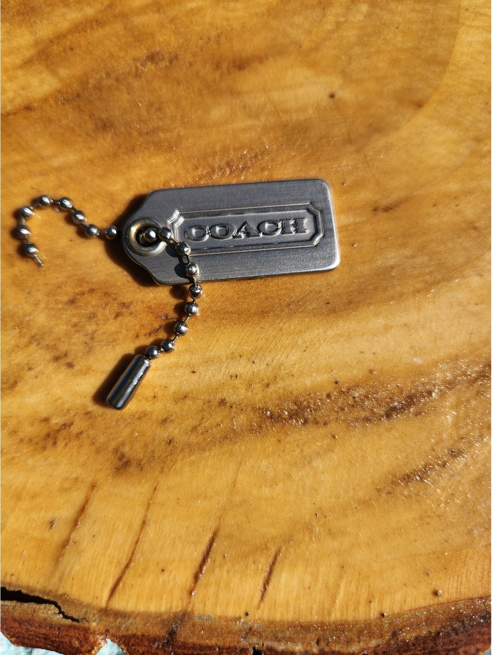 Coach silver metal hang tag 1.5 inch